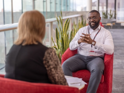 Atradius colleagues having a face to face office meeting
